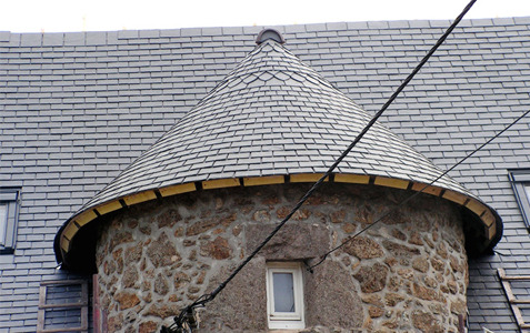 Roofing slate on a round tower